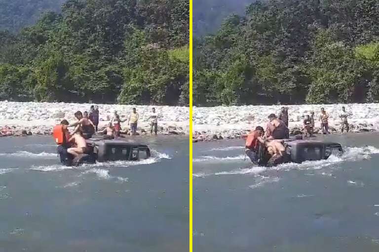 VÍDEO: jovens indianos tentam cruzar rio com SUV e ficam ilhados em cima do carro
